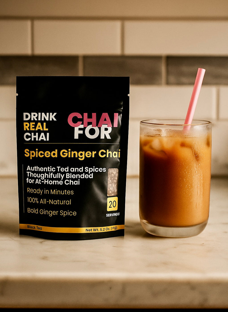 Spiced Ginger Chai tea with a glass of iced chai on a countertop.