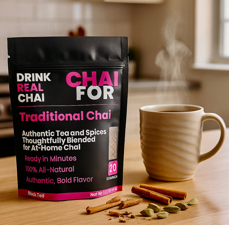 Chai tea packaging with a steaming mug and spices in a kitchen